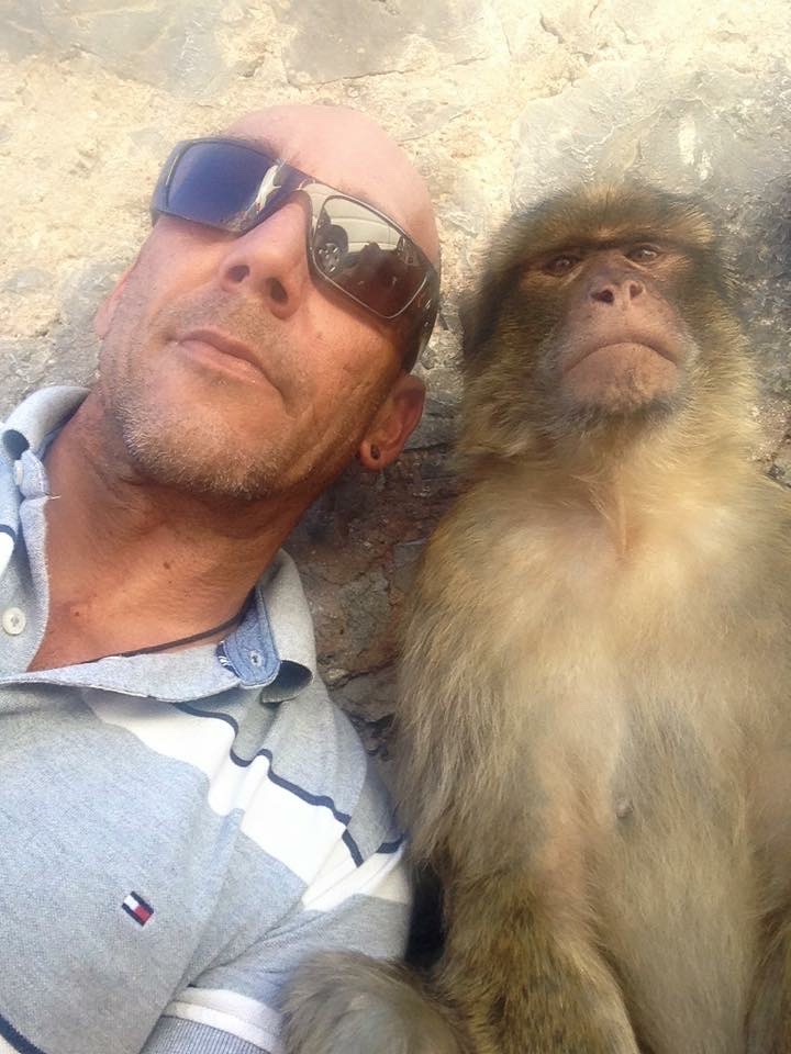 Your guide with a Barbary macaque on the Rock of Gibraltar